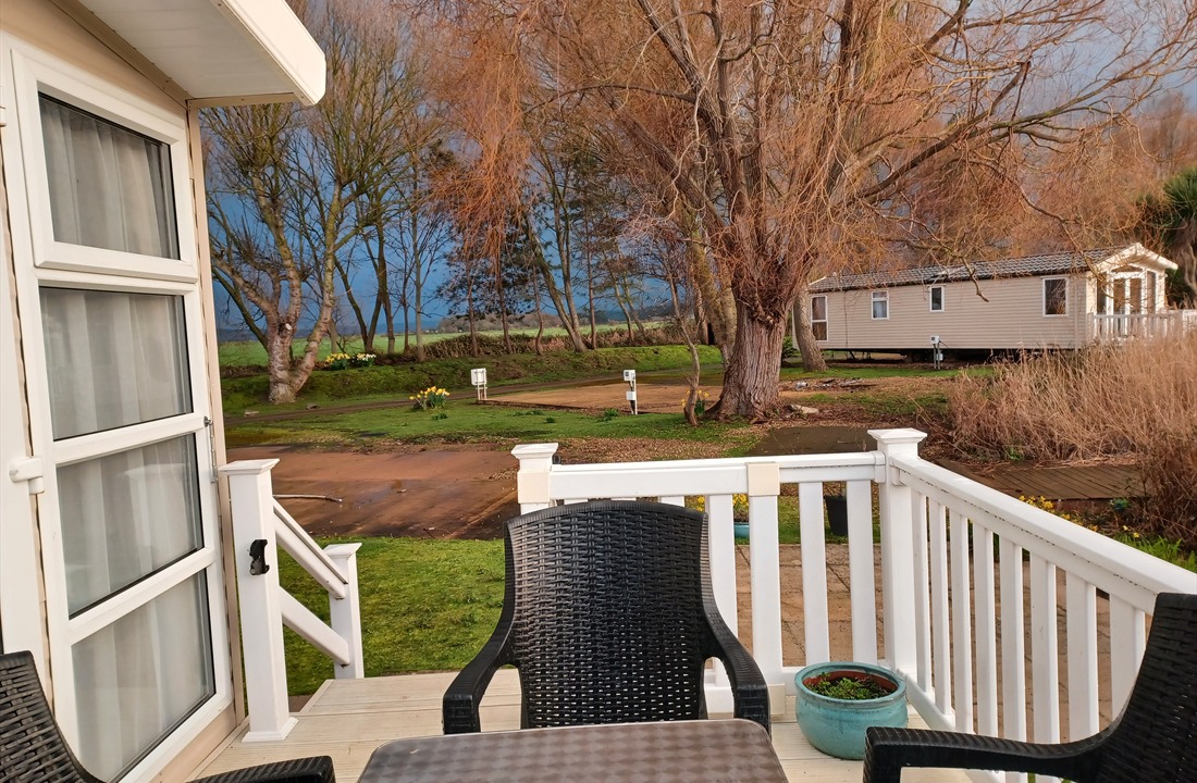 View from the caravan decking across the park